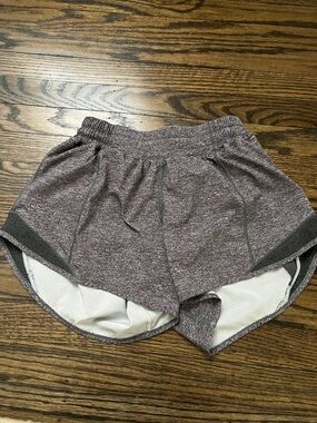 Lululemon Heathered Gray Hotty Hot shorts size 4 Tall 4”inseam